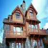 Condominiums with a mix of handcrafted log and timberframe elements